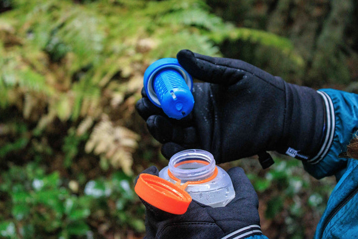 A KatadynBeFree filter being insalled in a Cnoc Vector 42mm water container