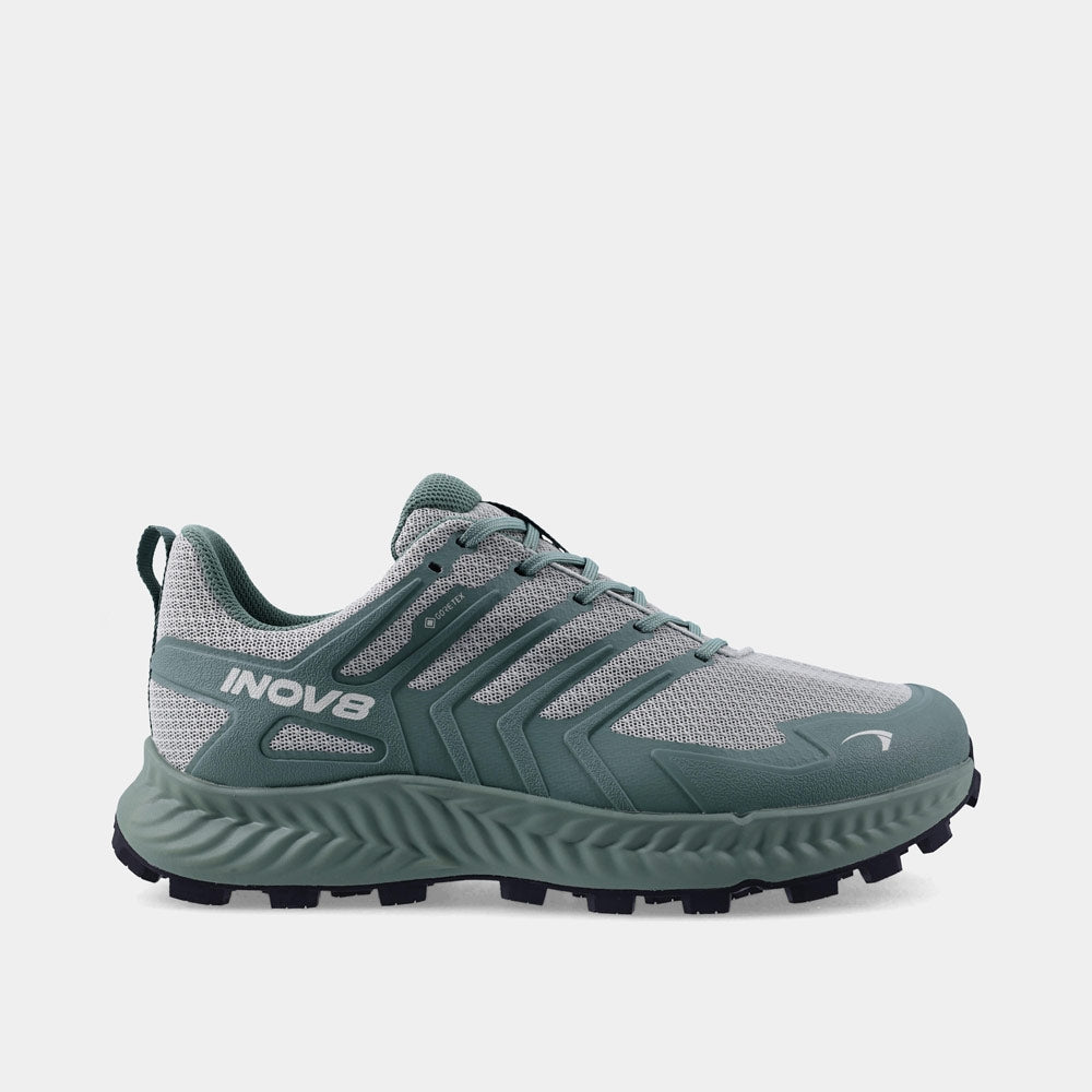 Green and grey hiking shoe with INOV8 branding on a white background