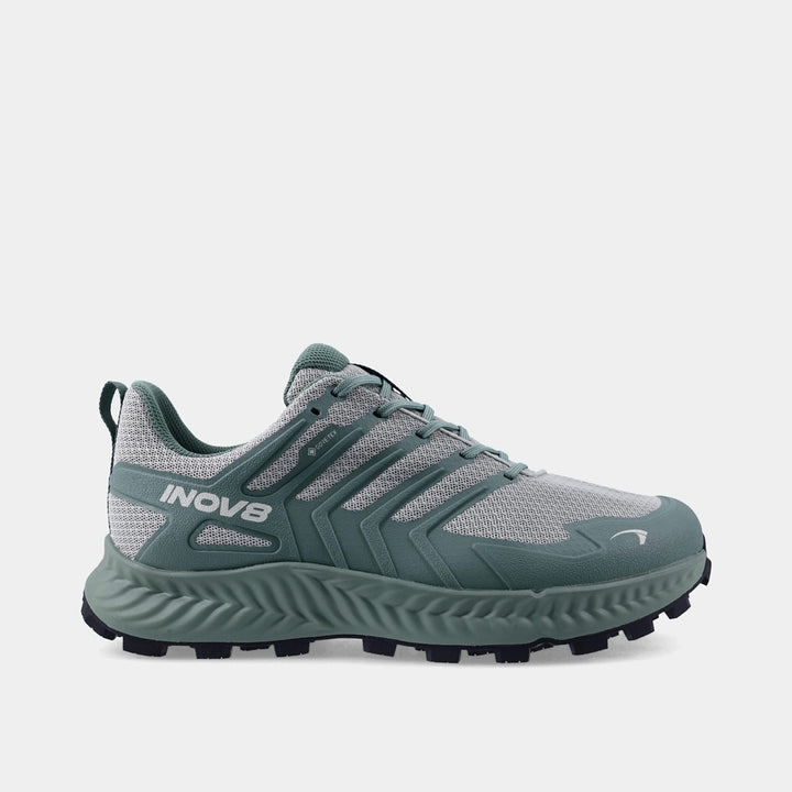 Green and grey hiking shoe with INOV8 branding on a white background
