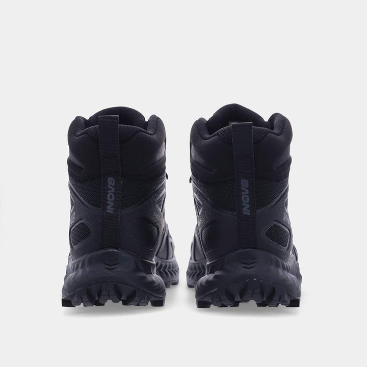 Back of pair of black hiking boots on a white background