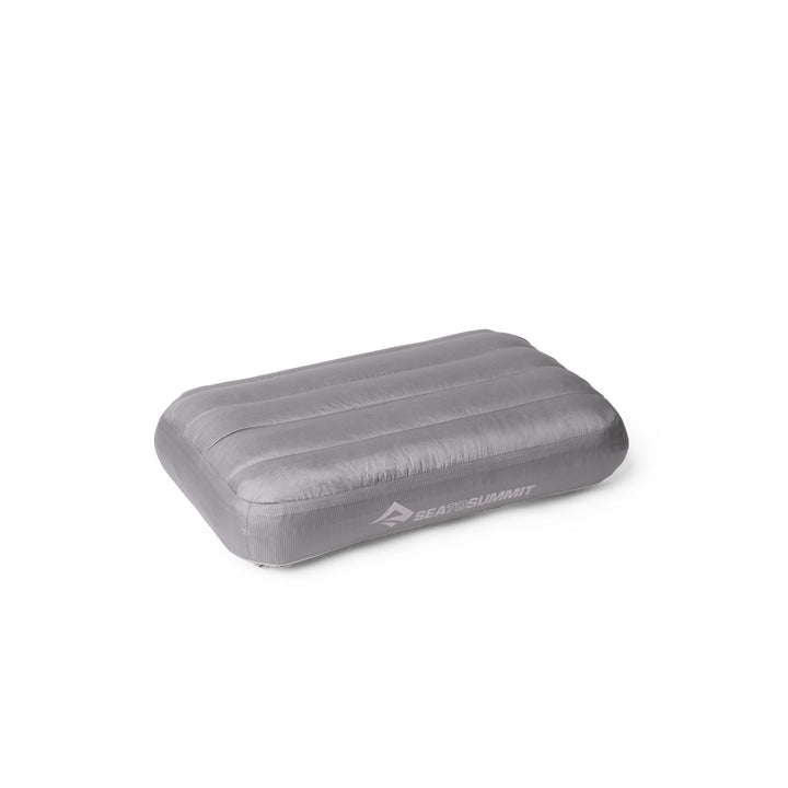 Grey inflatable pillow with Sea to Summit logo on a white background