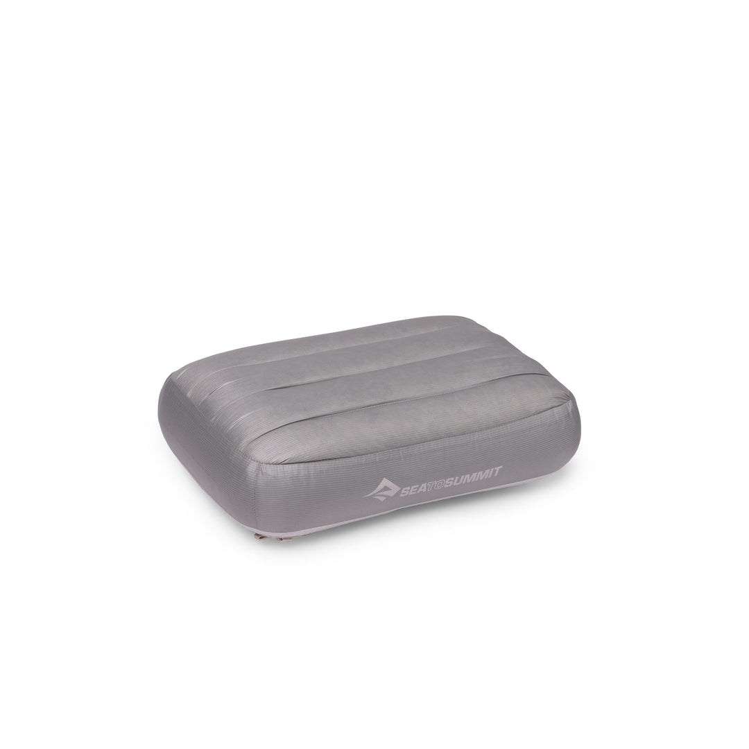 Grey inflatable pillow with Sea to Summit logo on a white background