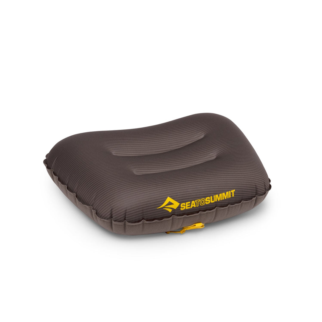 Dark grey inflatable pillow with Sea to Summit logo on a white background