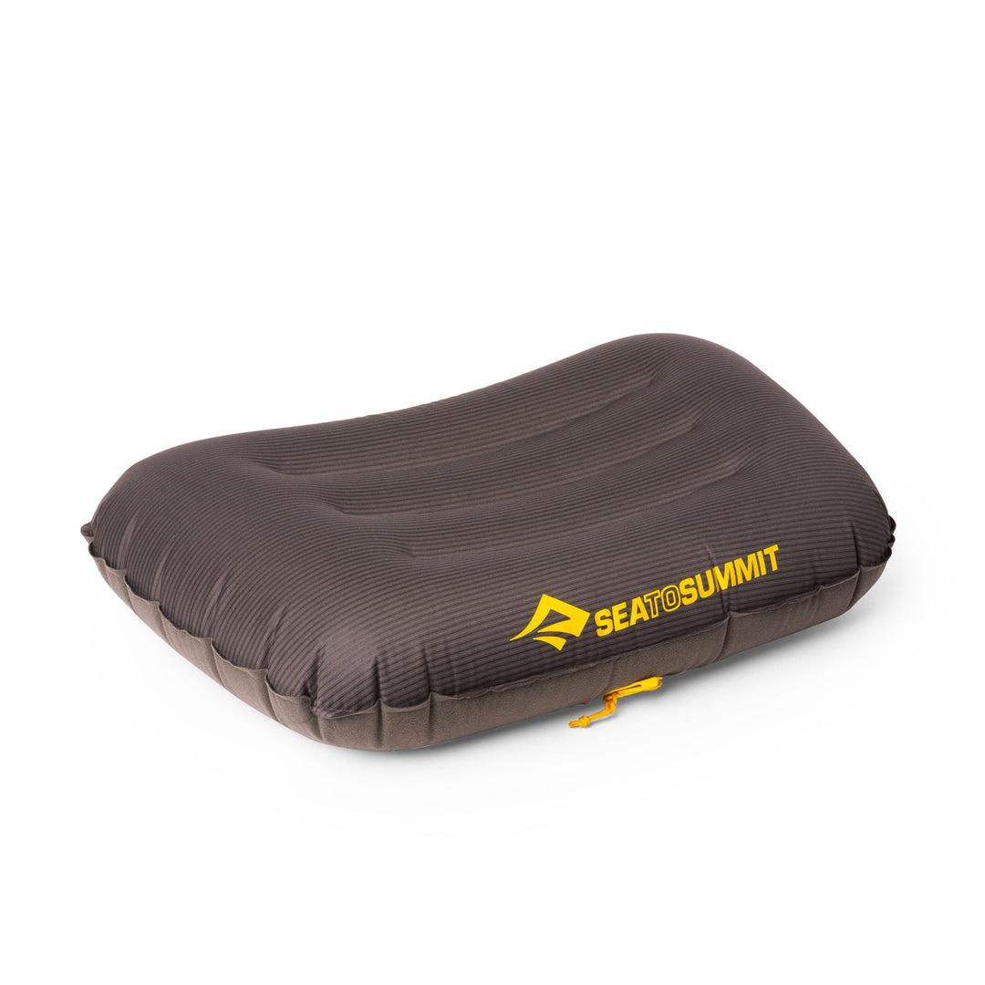 Dark gray inflatable pillow with Sea to Summit logo on a white background