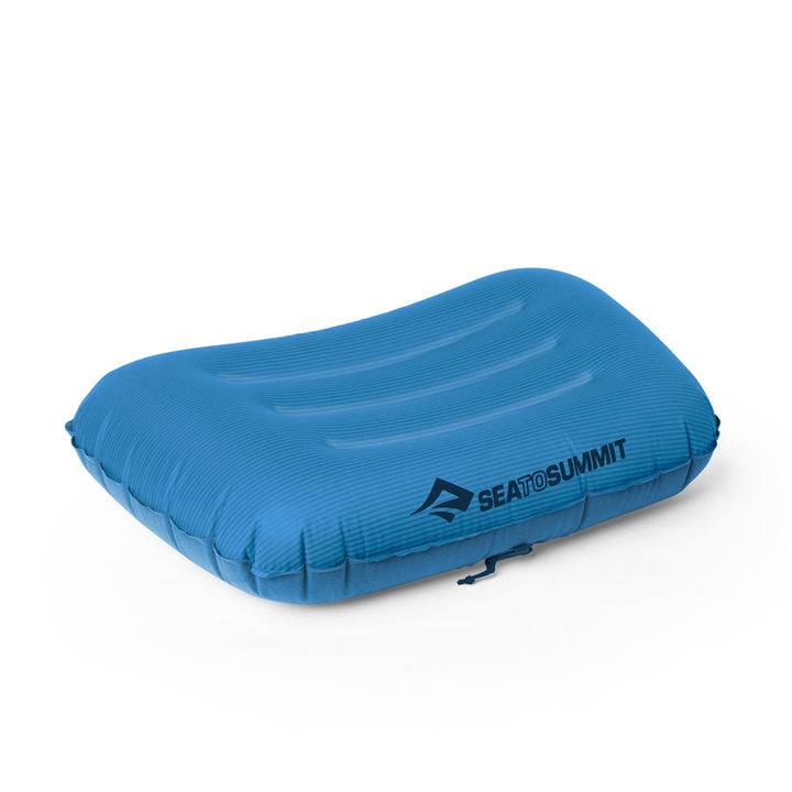 Blue inflatable pillow with Sea to Summit logo on a white background