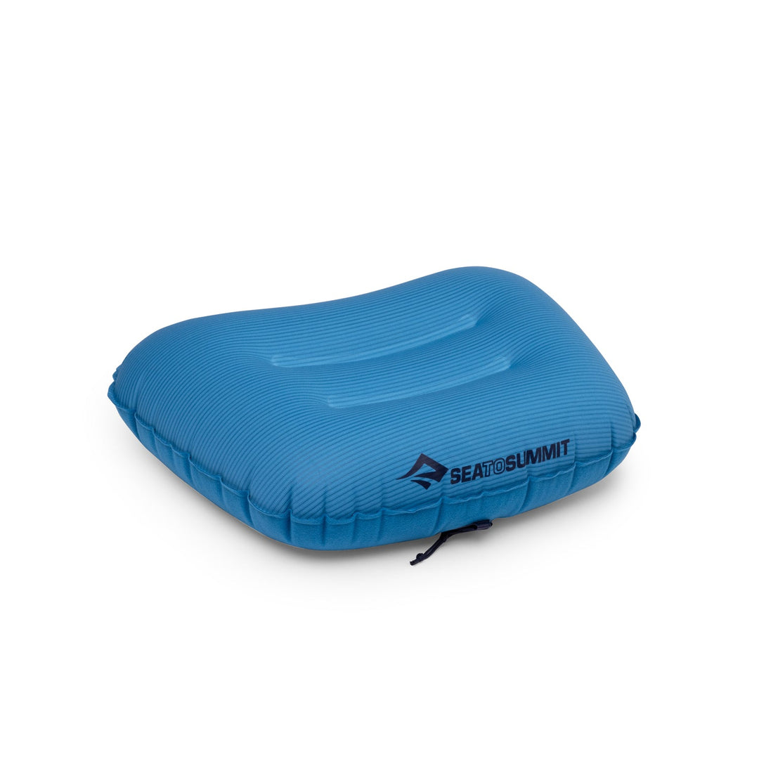 Blue inflatable pillow with Sea to Summit logo on a white background