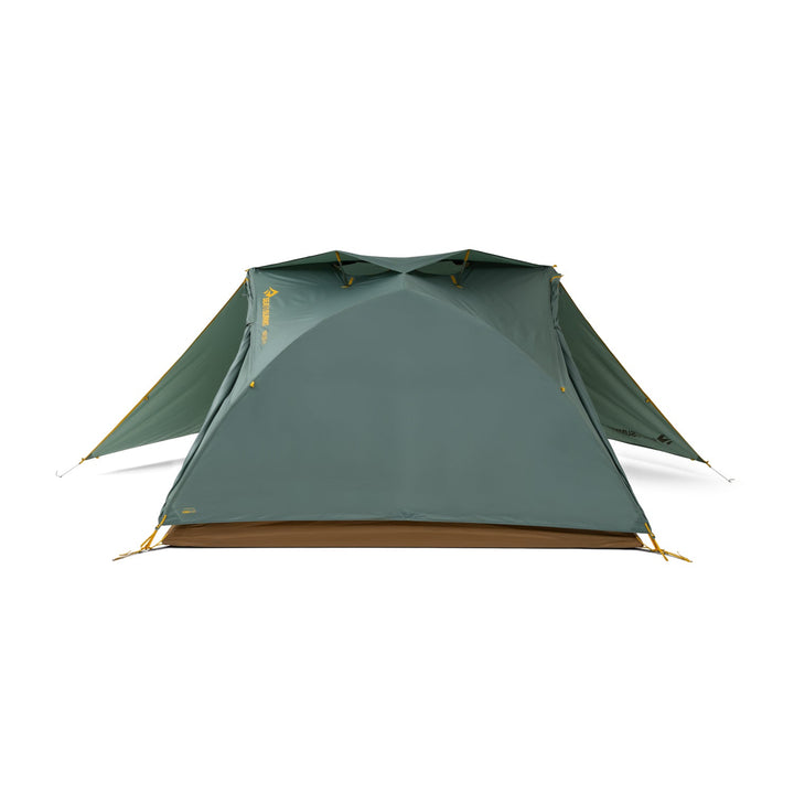 Green and brown tent with open doors on a white background.