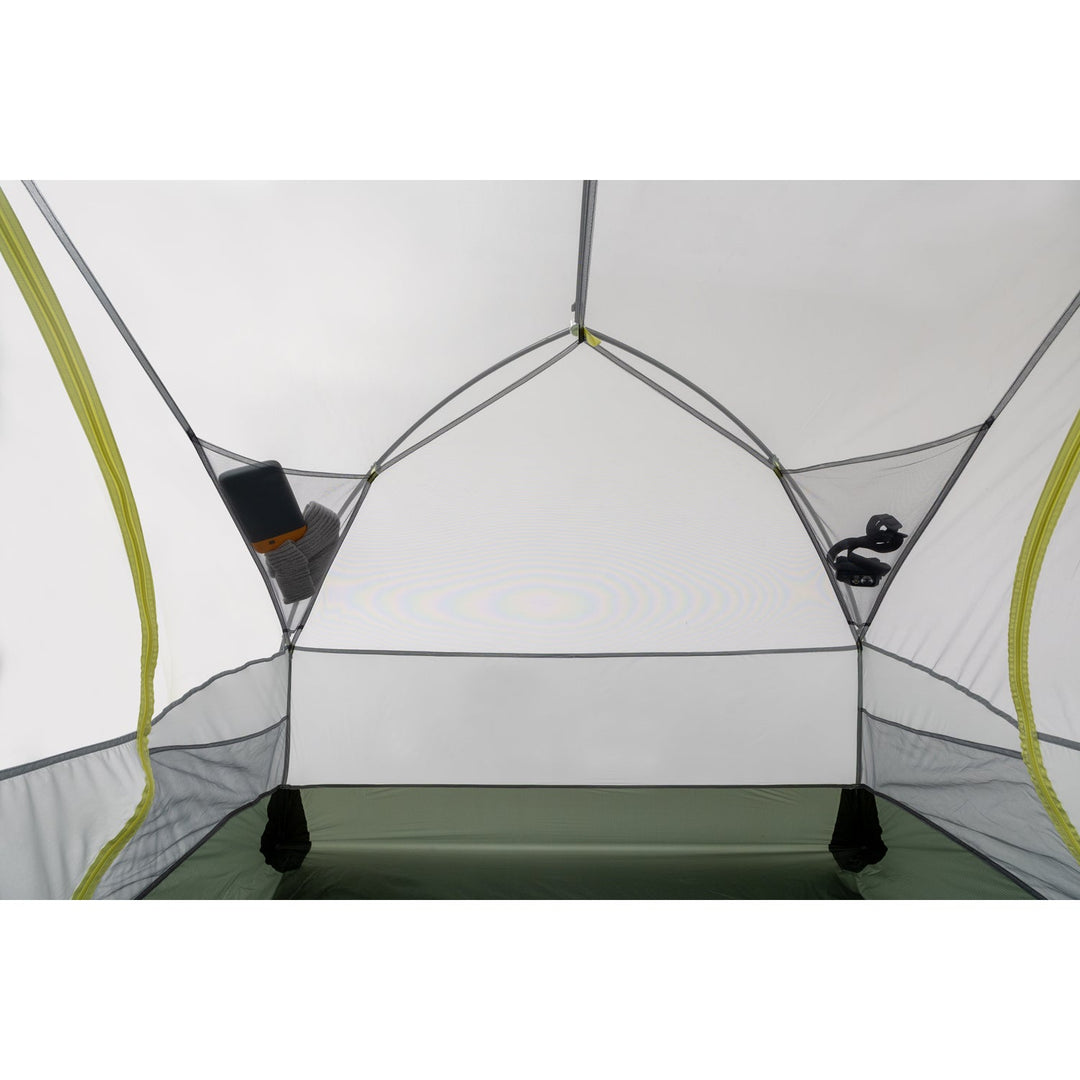Inside of grey tent with light green zips and mesh pockets.