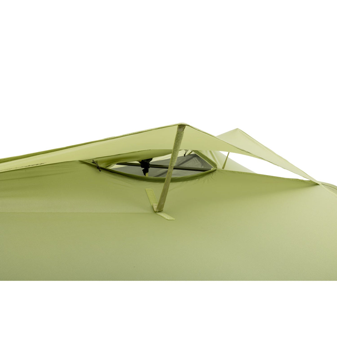 Close up of an open air vent of a green tent.