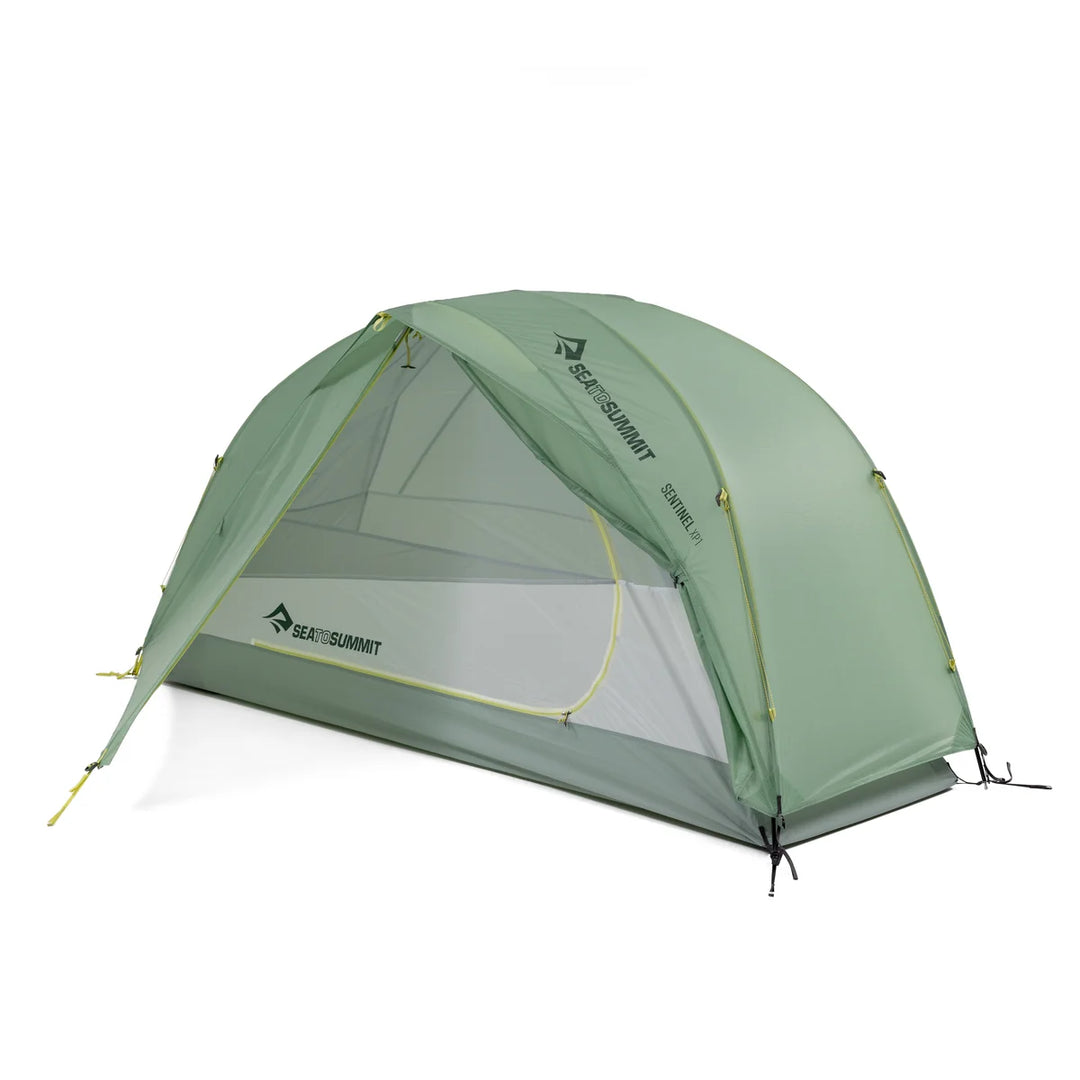 A Sea to Summit Expedition dome tent in sage green with a mesh inner floor and yellow zipper accents, shown on a clean white background.