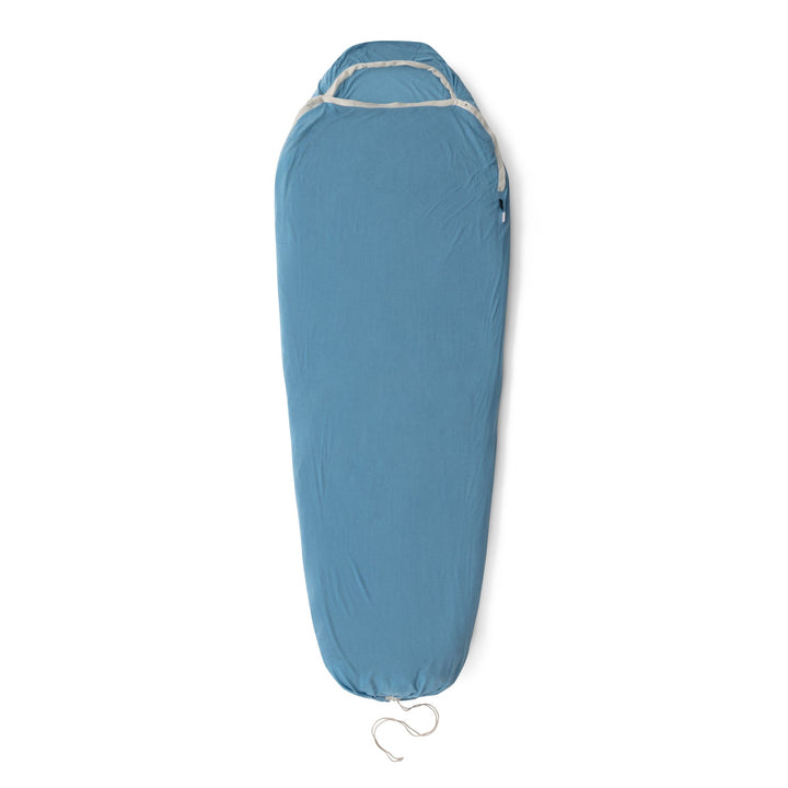 Blue sleeping bag liner on a white background