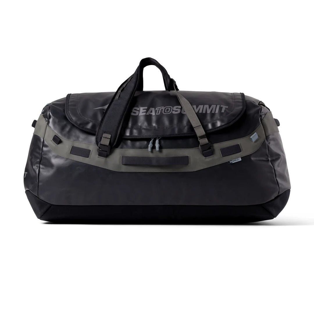 A black Sea to Summit duffel bag with gray webbing straps and a gray logo on the front flap, shown against a plain white background.
