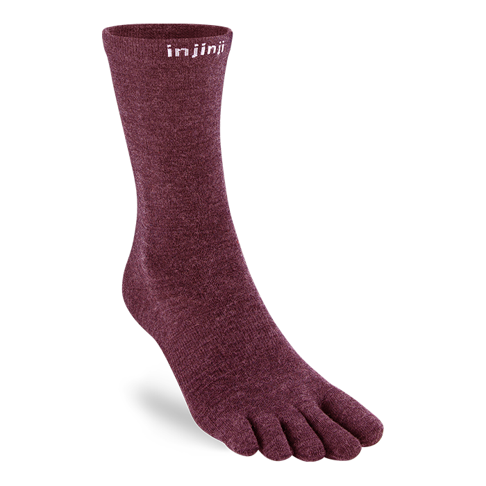 Maroon toe sock on a white background
