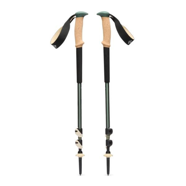 Pair of green hiking poles with cork grips, collapsed, on a white background