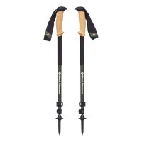 A pair of dark green trekking poles, collapsed, on a white background.