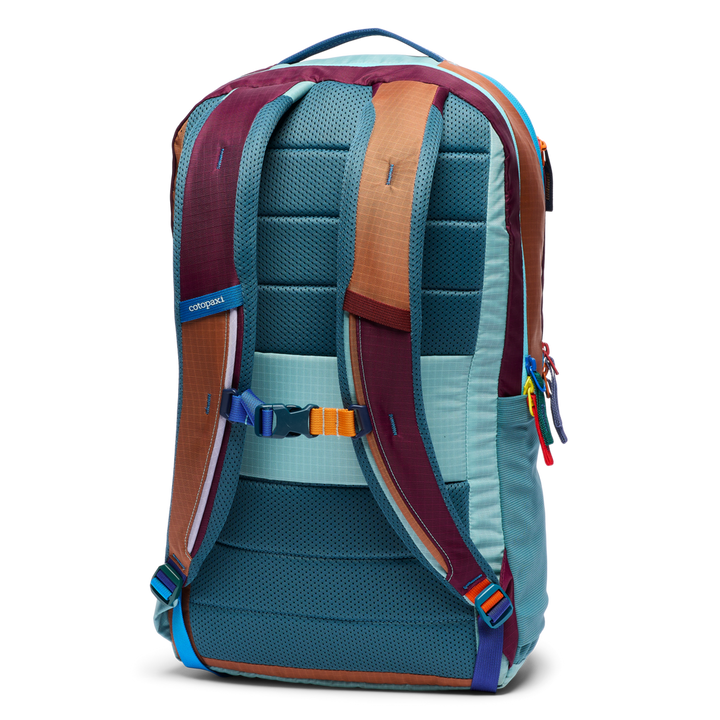 Multicolored backpack with visible brand logo on a white background