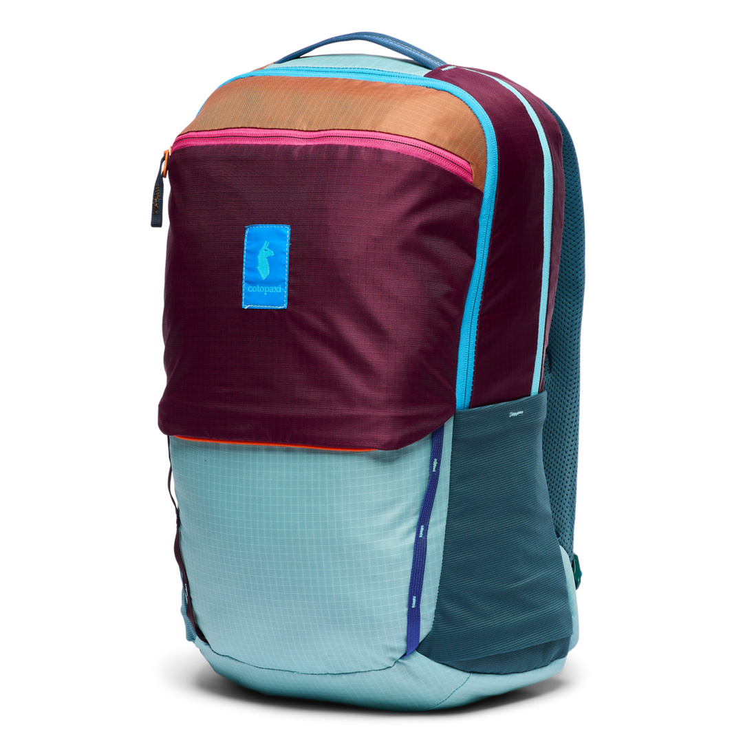 Multicolored backpack with a visible brand logo on a white background