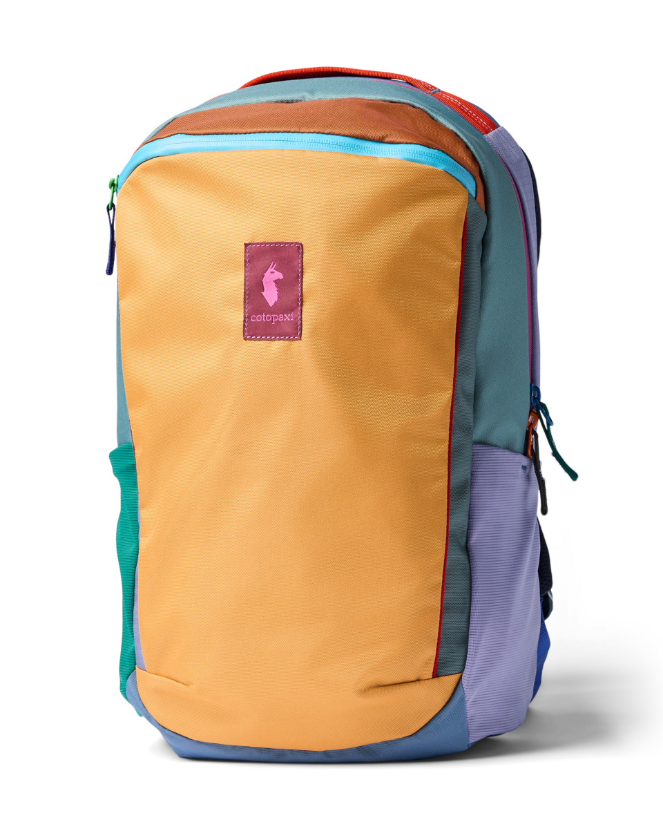 Multicolored backpack with a visible brand logo on a white background