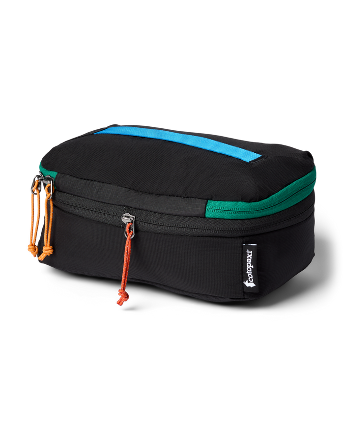 Black packing cube with blue and orange accents on a white background