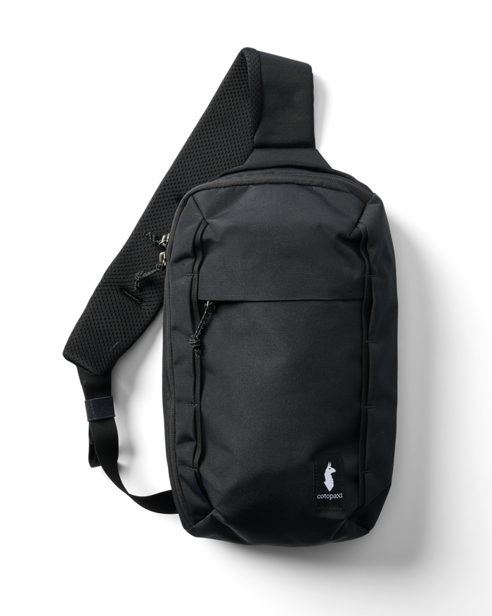 Black sling bag with a visible brand logo on a white background