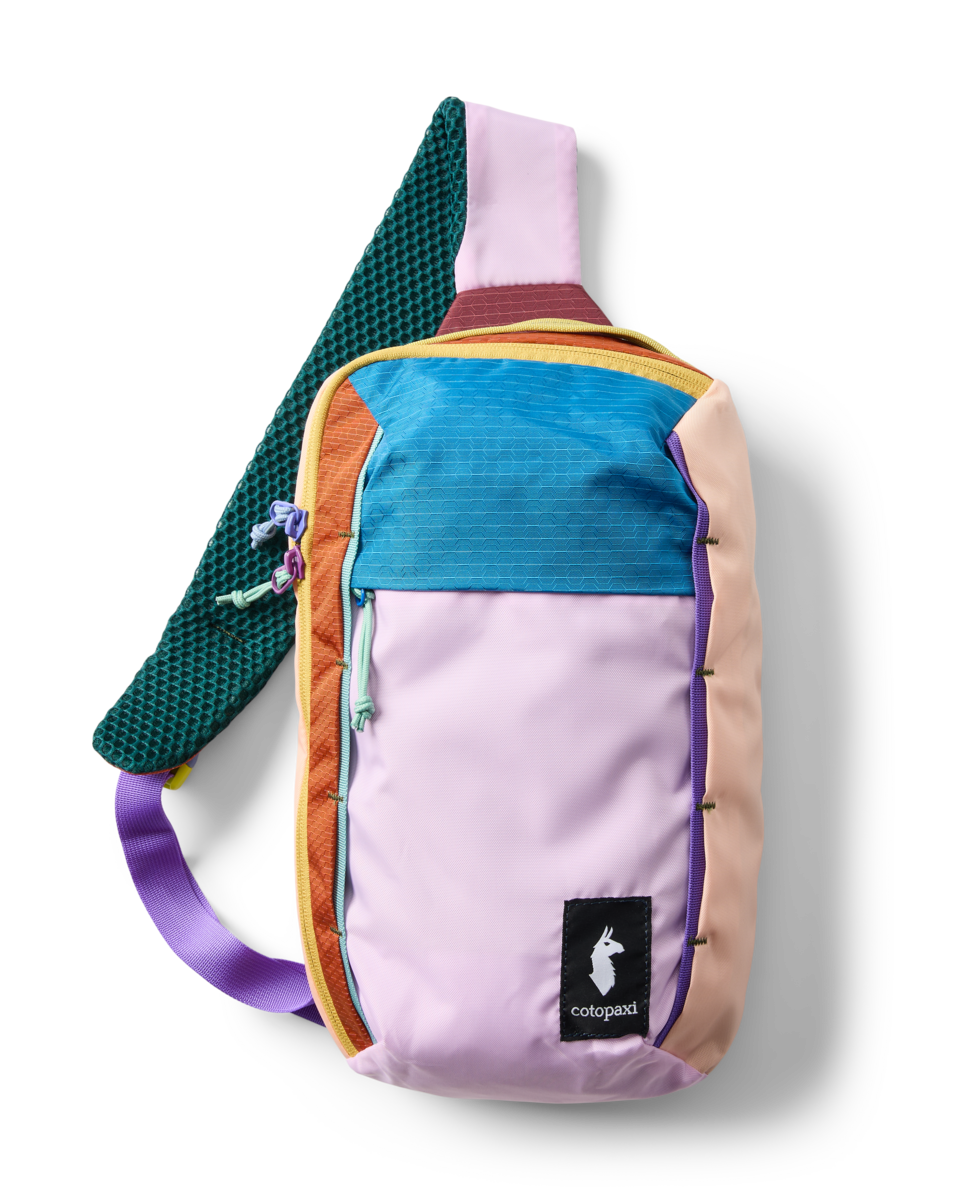 Multicolored sling bag with a visible brand logo on a white background