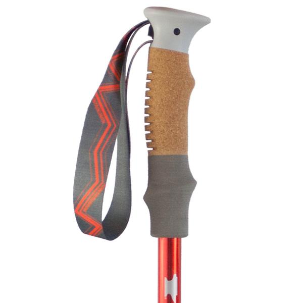 Cork-handled hiking pole with red shaft and gray strap on a white background