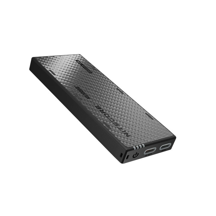 Black power bank with textured surface on a white background