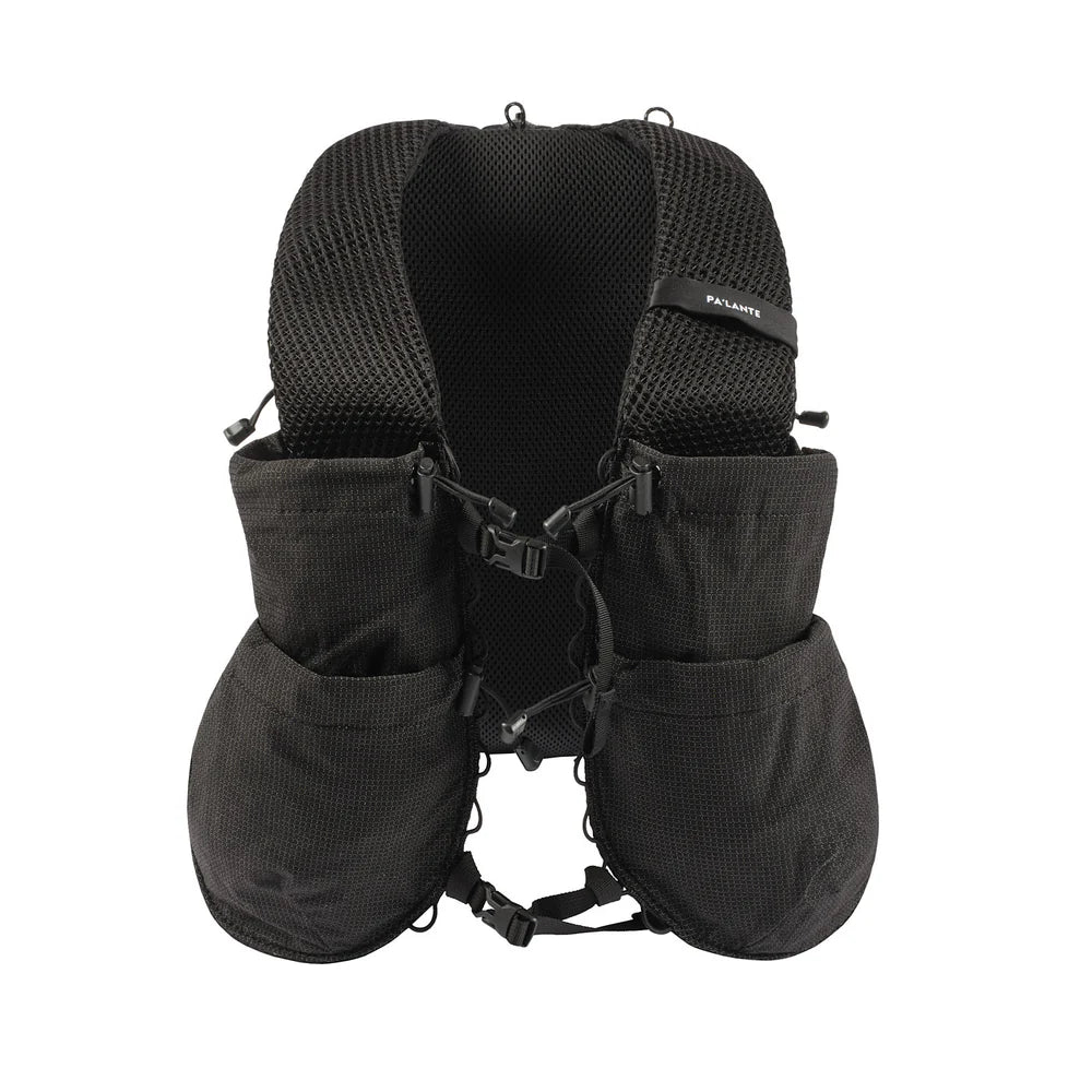Black tactical vest with multiple pockets and straps on a white background
