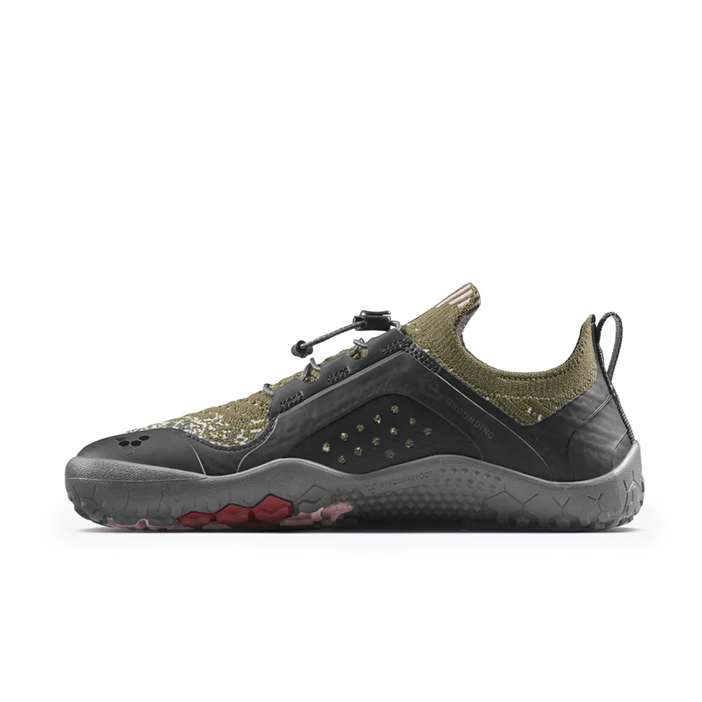 Black and olive green athletic shoe on a white background