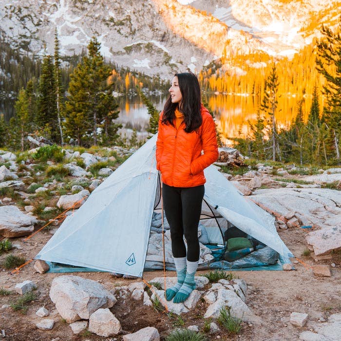 Person standing next to a HMG Unbound tent wearing Injinji toe socks