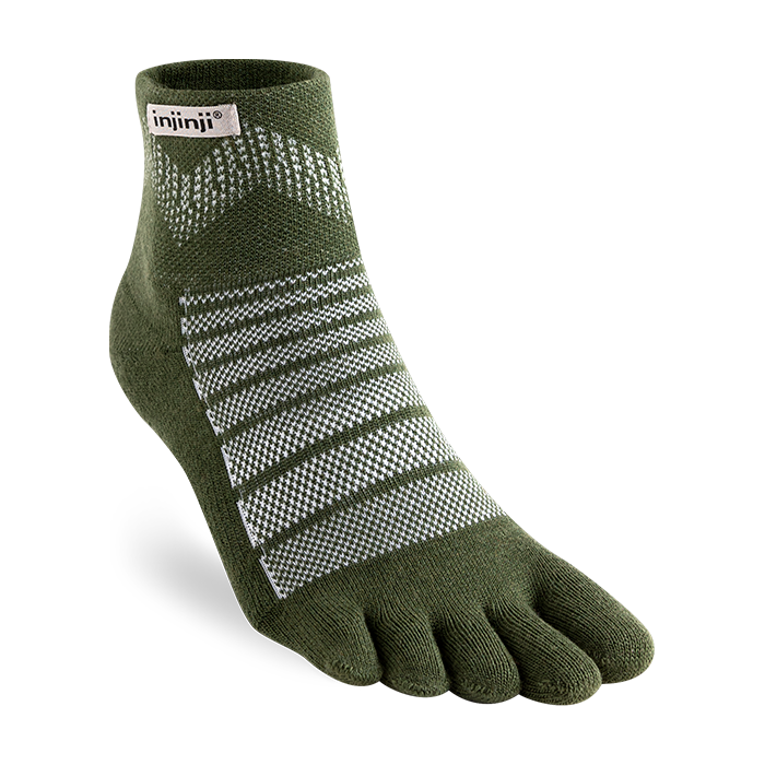 Green, woolen, toe sock with white pattern on a white background