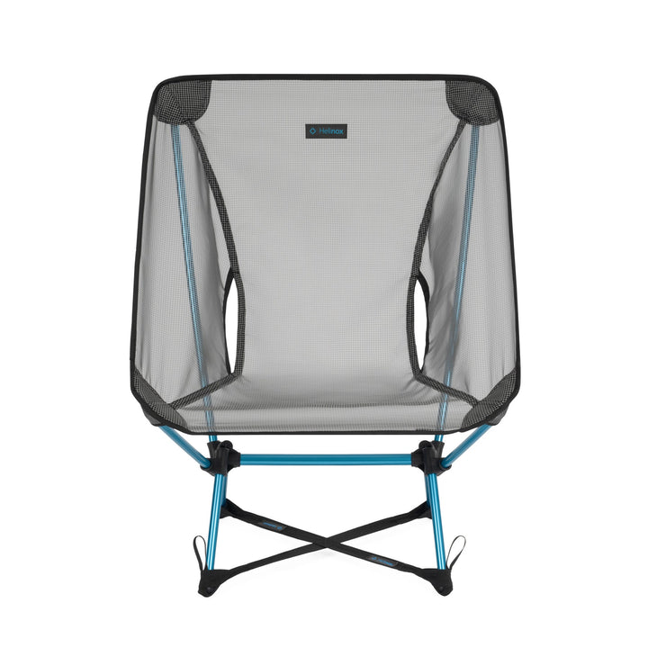 Blue and black hiking chair with an x-shaped footprint connected to the feet