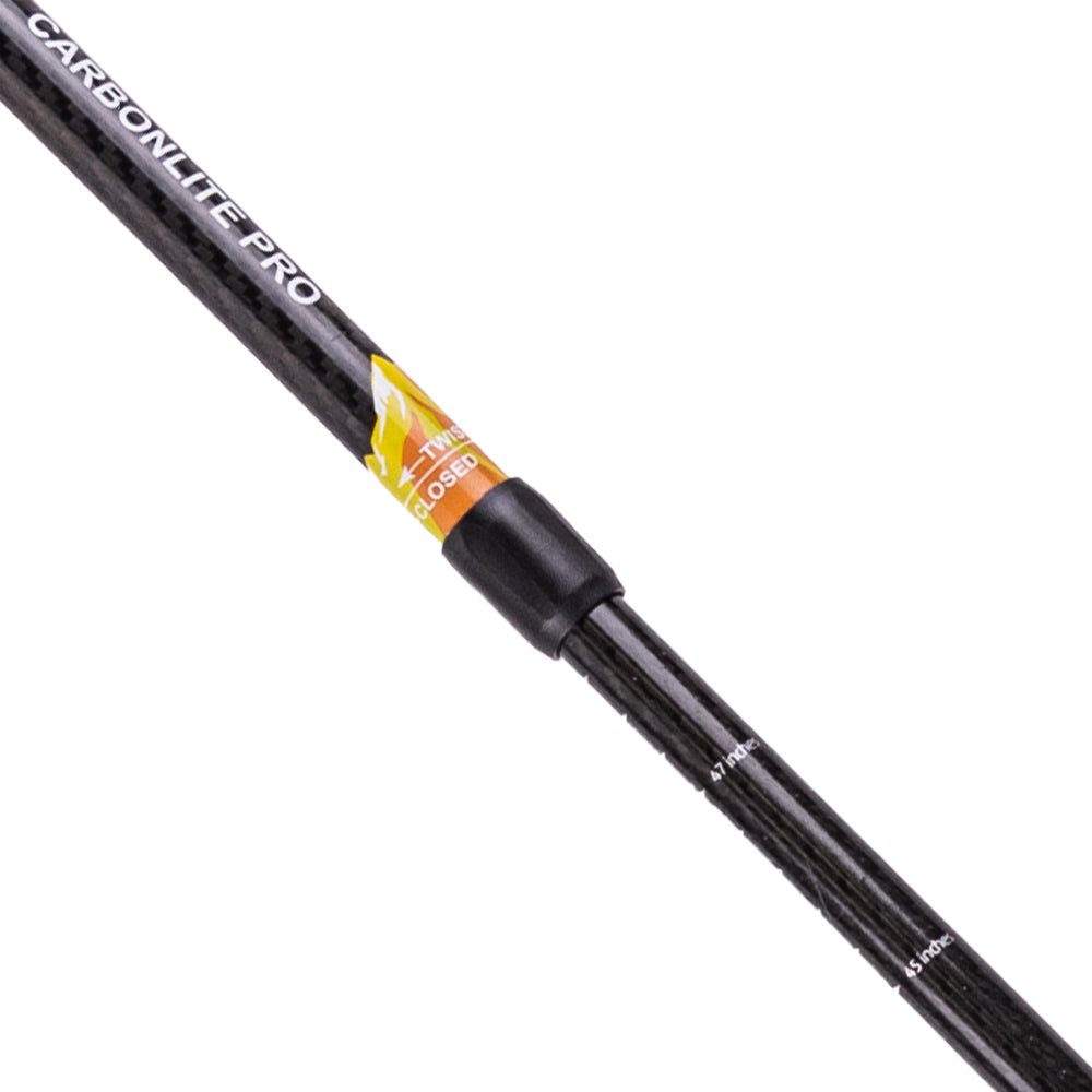 Black carbon fiber hiking pole with 'Carbonlite Pro' branding on a white background