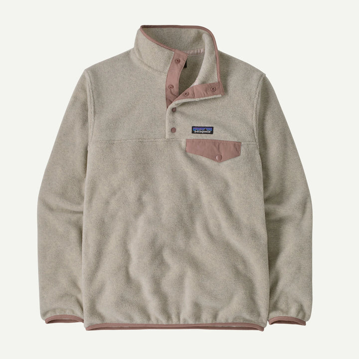 A beige fleece pullover with dusty rose trim on the collar, placket, pocket, and cuffs, featuring a small Patagonia logo patch on the chest.