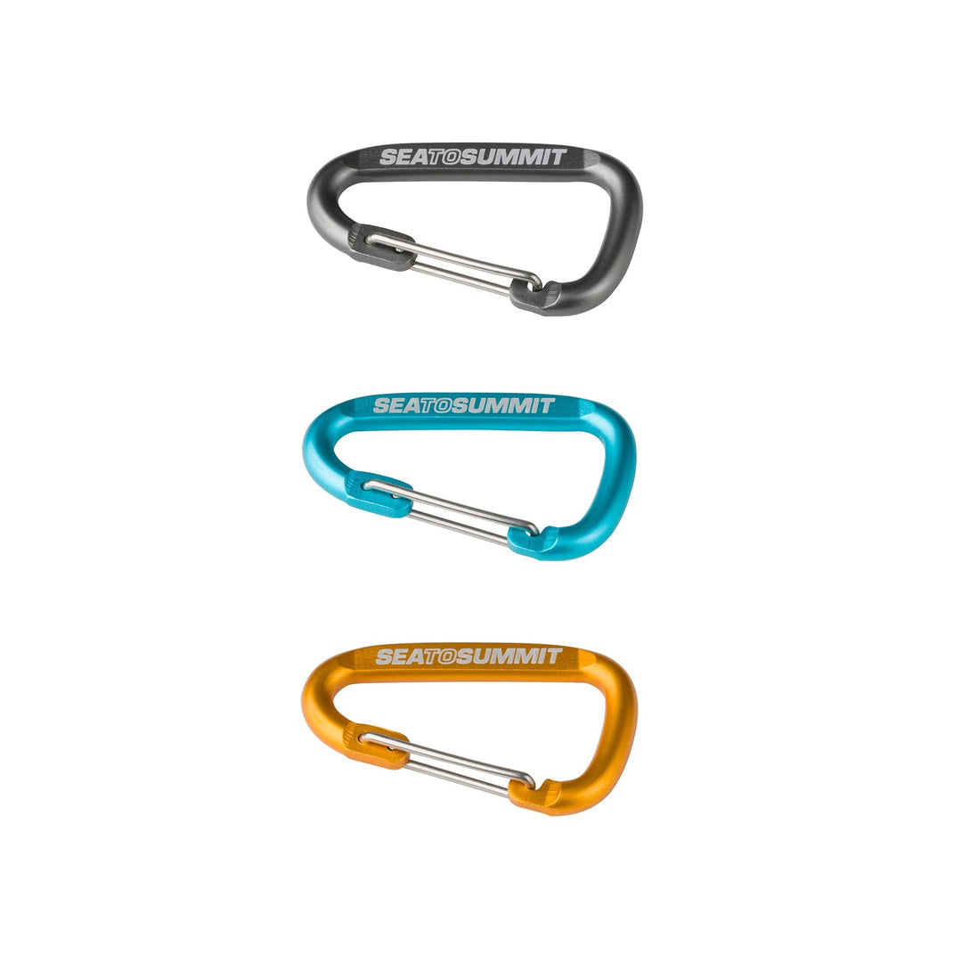 Three carabiners in dark grey, blue, and orange on a white background