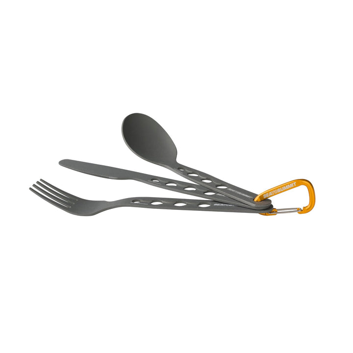 Set of camping utensils held together by a small orange carabiner