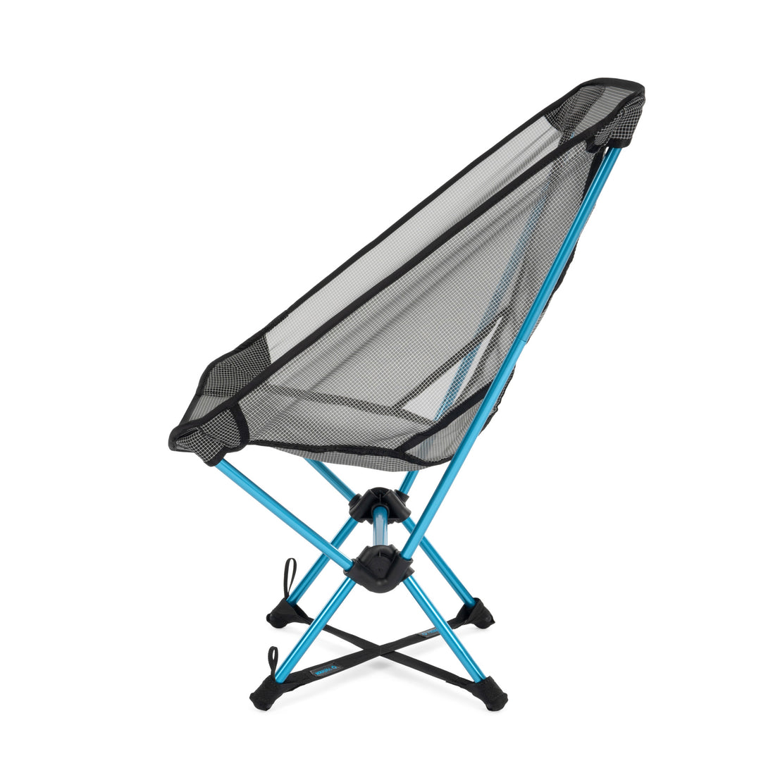Blue and black hiking chair with an x-shaped footprint connected to the feet, viewed in profile
