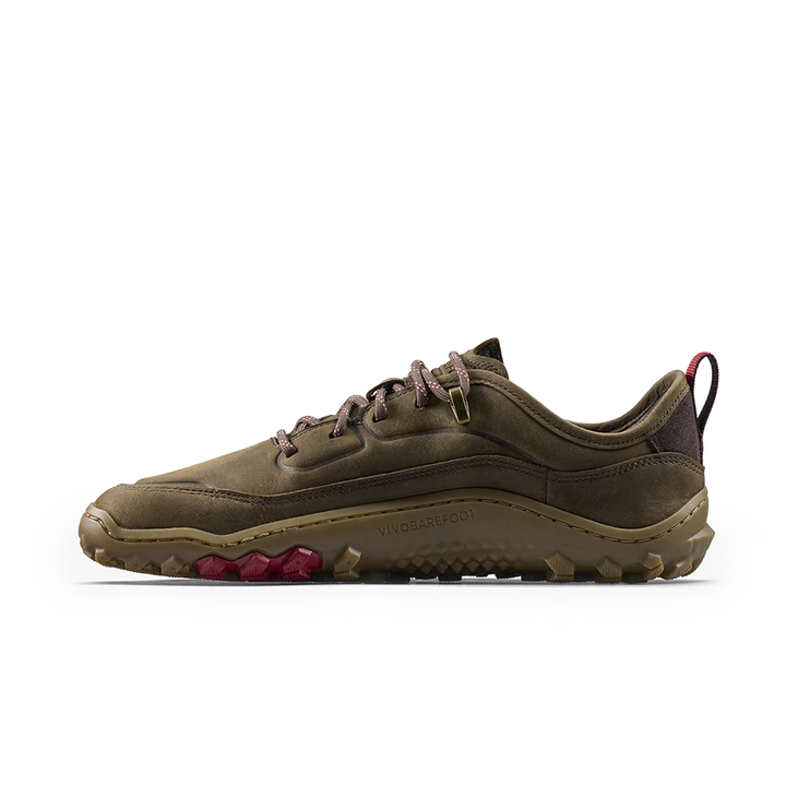 A single Vivo barefoot shoe in olive brown suede and synthetic materials, featuring brown laces, a dark brown collar, and magenta accents on the outsole and heel pull tab, shown against a plain white background.