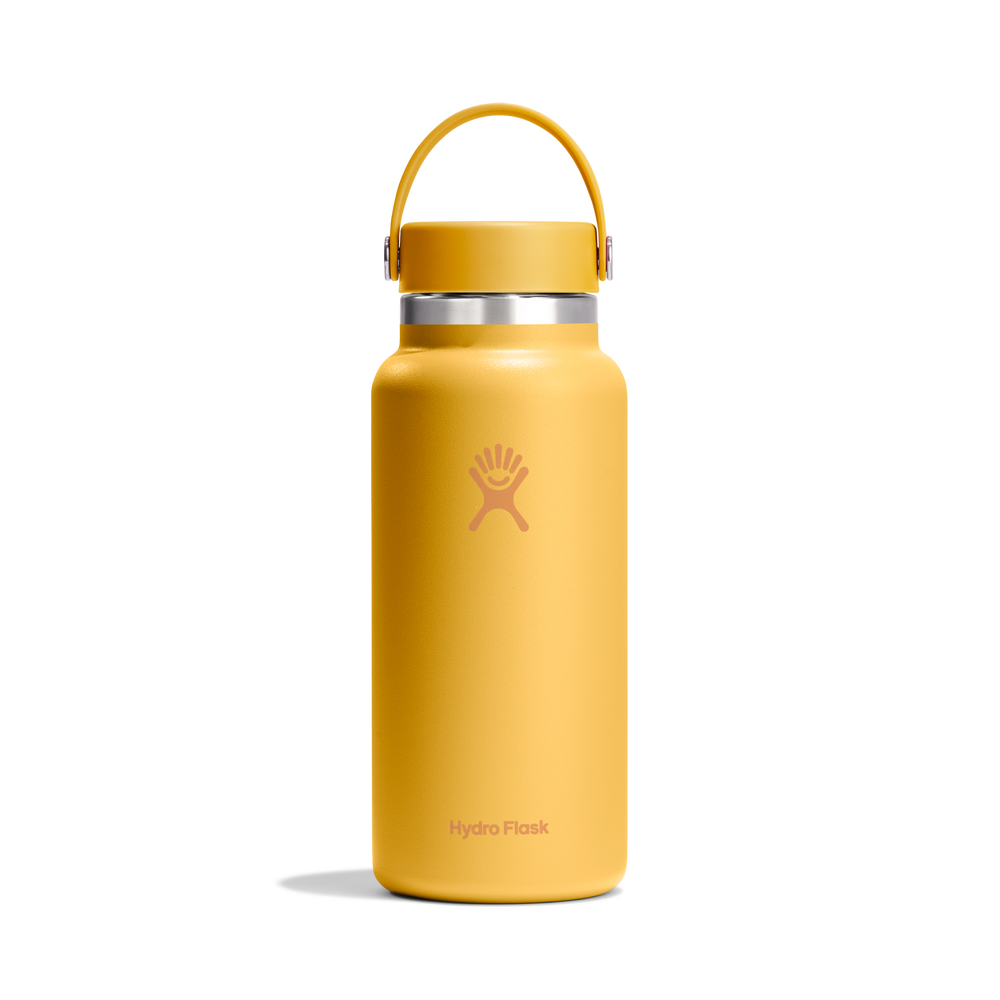 Yellow insulated water bottle with Hydro Flask logo and pivoting handle on a white background