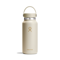 Cream insulated water bottle with Hydro Flask logo and pivoting handle on a white background