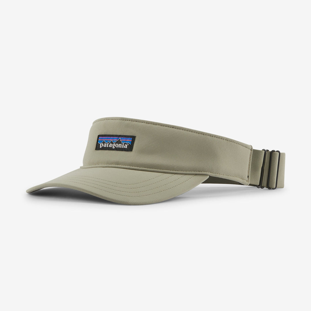 Beige visor with Patagonia logo on a white background