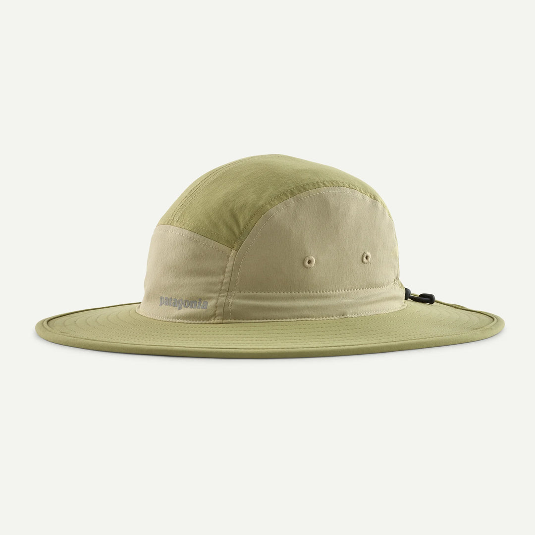Green and beige bucket hat on a white background