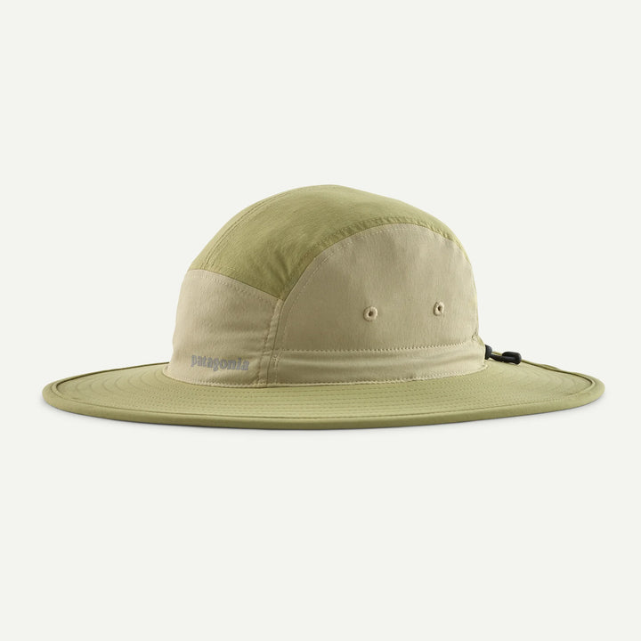 Green and beige bucket hat on a white background