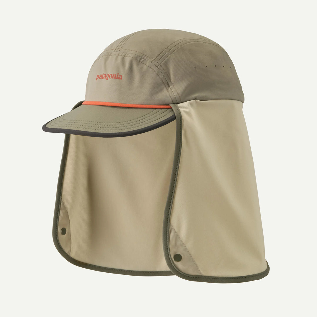 Beige cap with neck flap and Patagonia logo on a white background