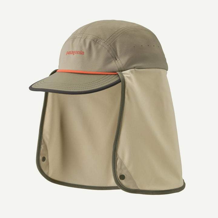 Beige cap with neck flap and Patagonia logo on a white background