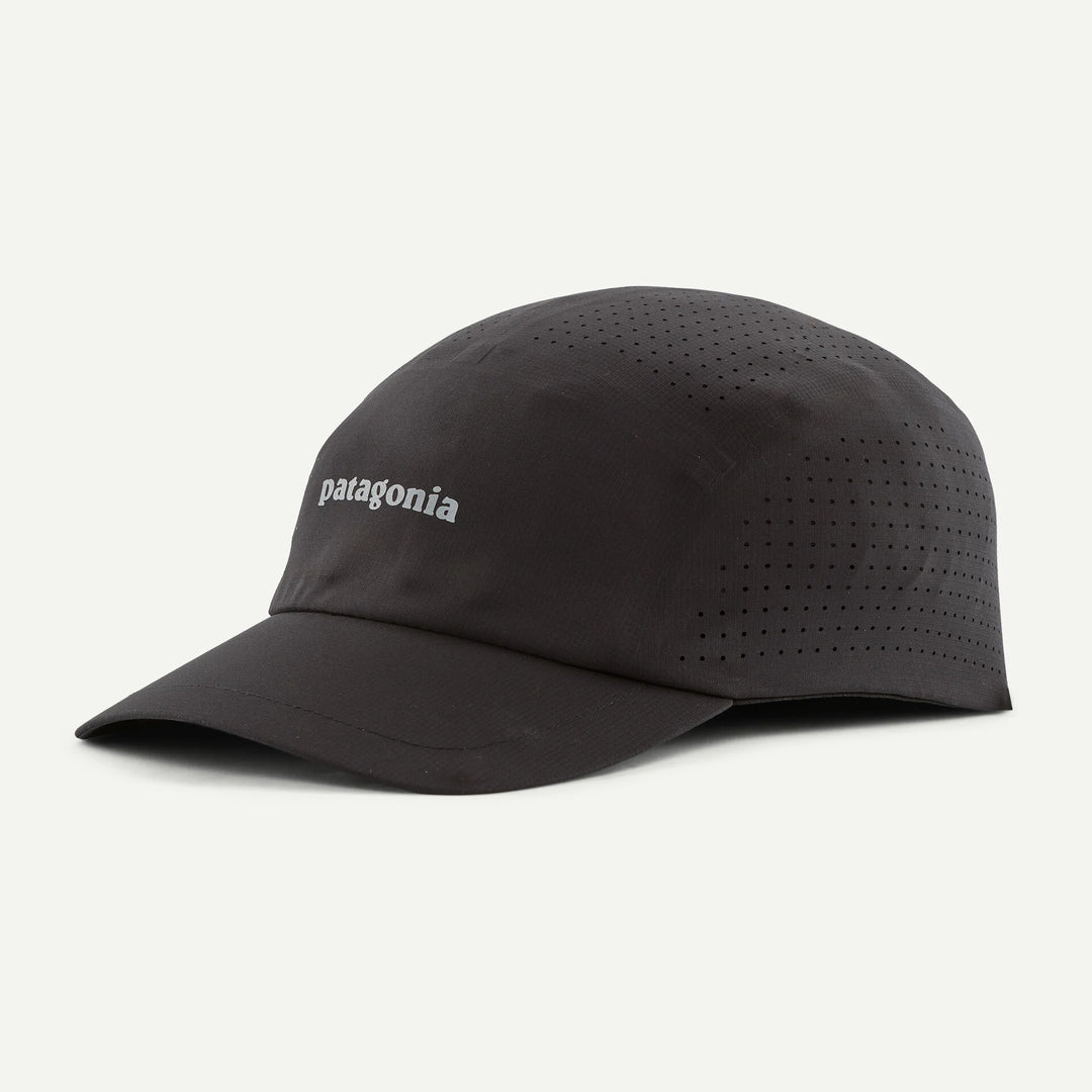 Black cap with mesh back on a light gray background