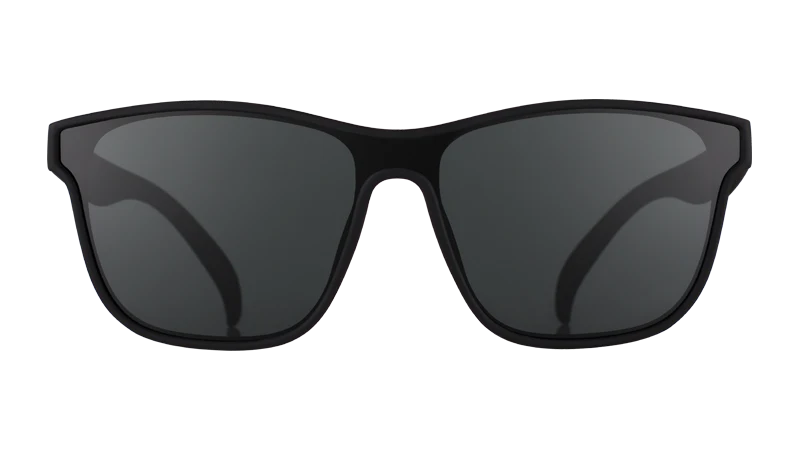 Black sunglasses with dark lenses on a white background