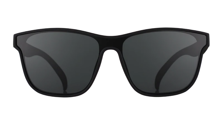 Black sunglasses with dark lenses on a white background