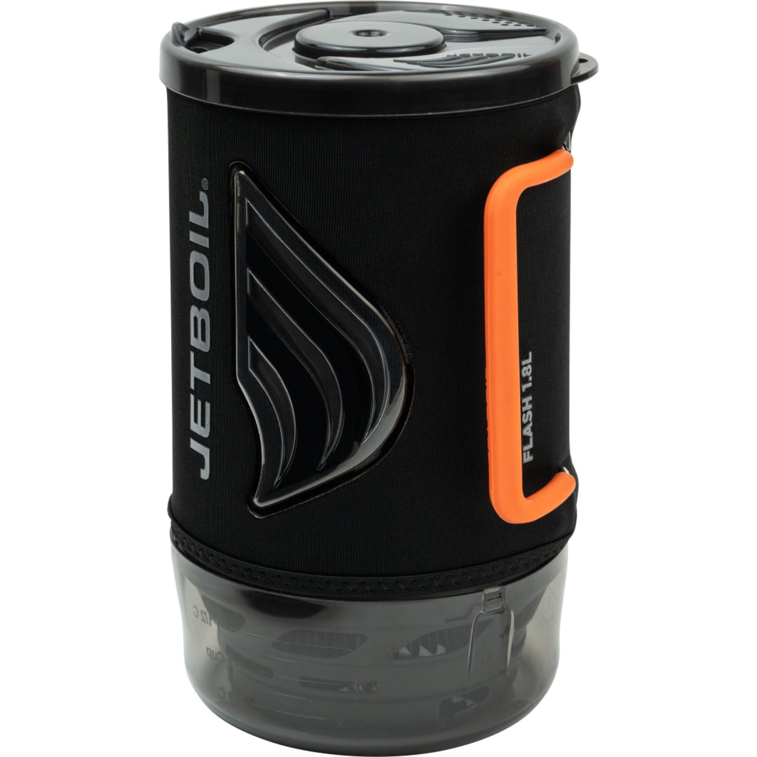Black Jetboil camping stove with orange handle on a white background