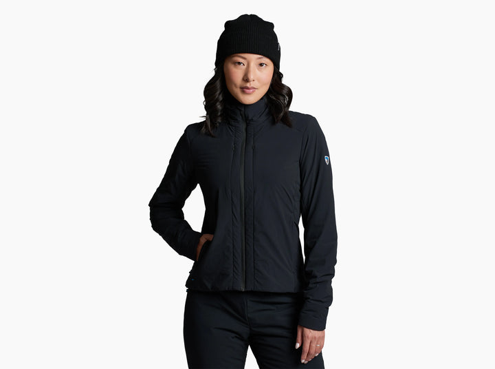 Woman wearing a black jackets and beaning on a white background